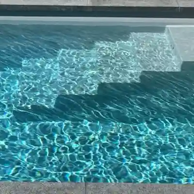 Piscine coque vinylester 11 x 4,20 m Moorea avec bac pour volet immergé