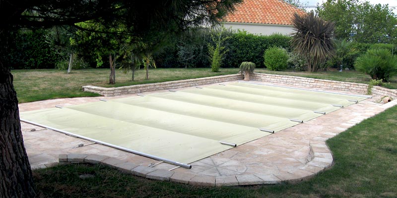 Bâche à barres de sécurité pour piscine - Spa & Piscine